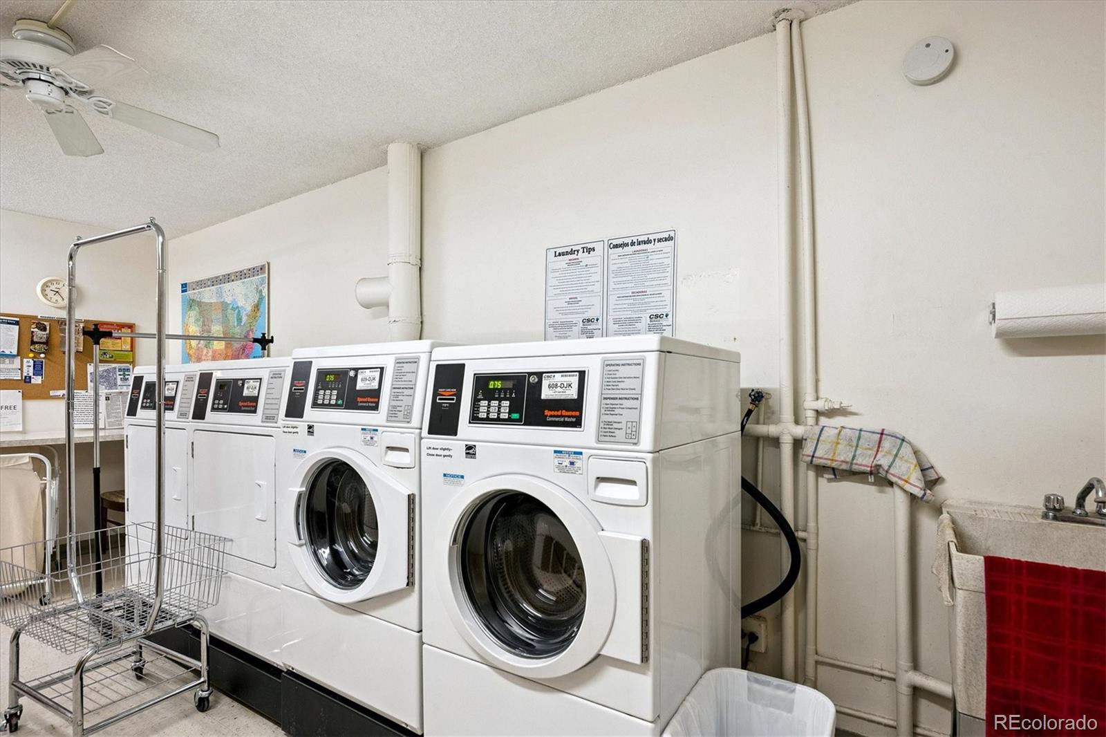 9625 Center Avenue, Unit 7B Denver, CO 80247 - Photo 17 of 49 a utility room with dryer and washer