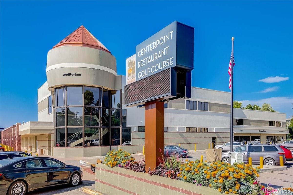 9625 Center Avenue, Unit 7B Denver, CO 80247 - Photo 21 of 49 a car parked in front of a building