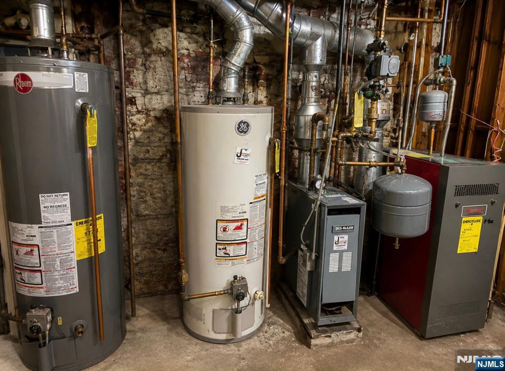 250-252 Berkeley Avenue Newark, NJ 07107 - Photo 2 of 5 a picture of water heater room