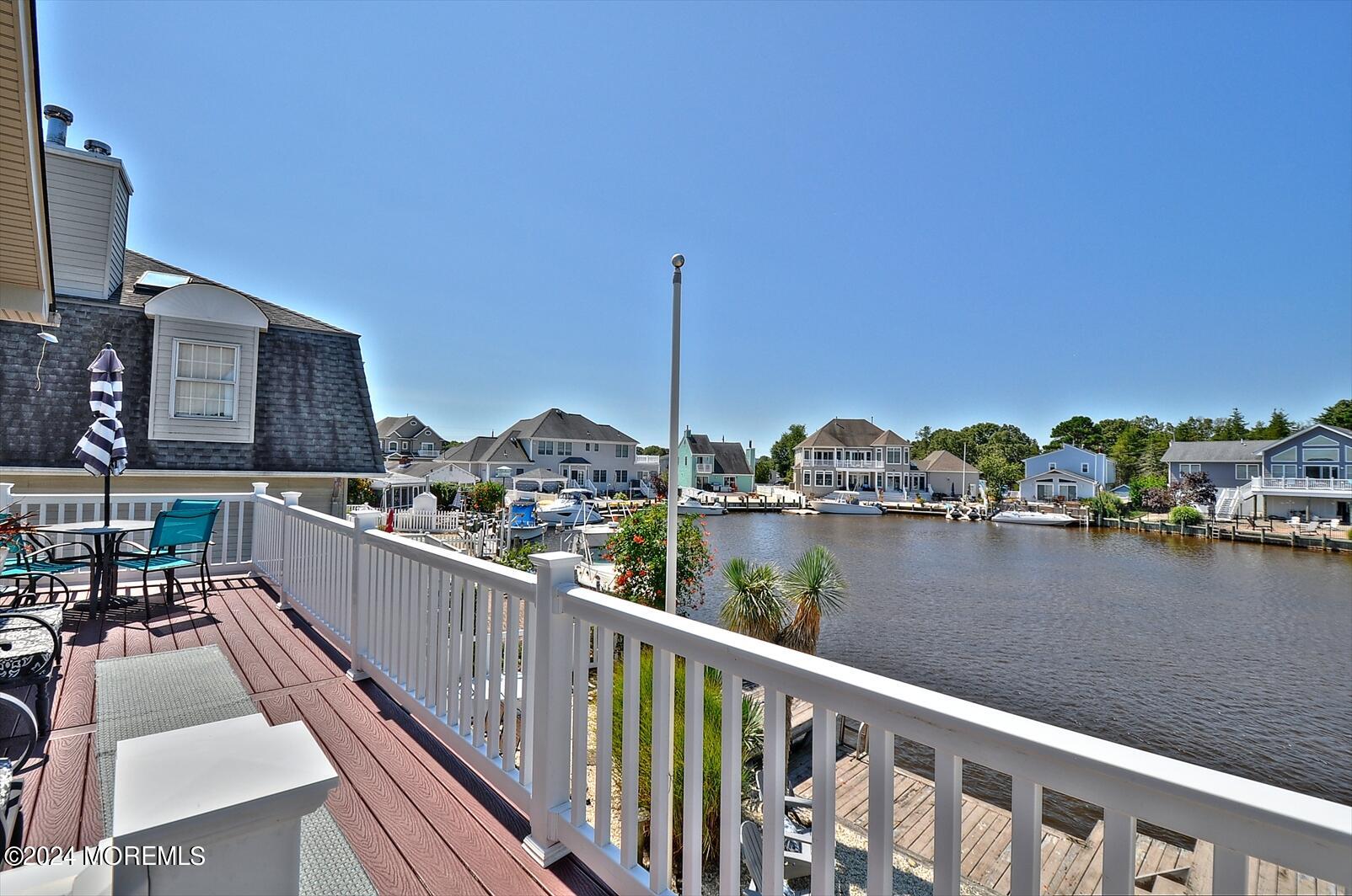 100 Cedar Run Road Bayville, NJ 08721 - Photo 24 of 39 a view of a lake from a balcony