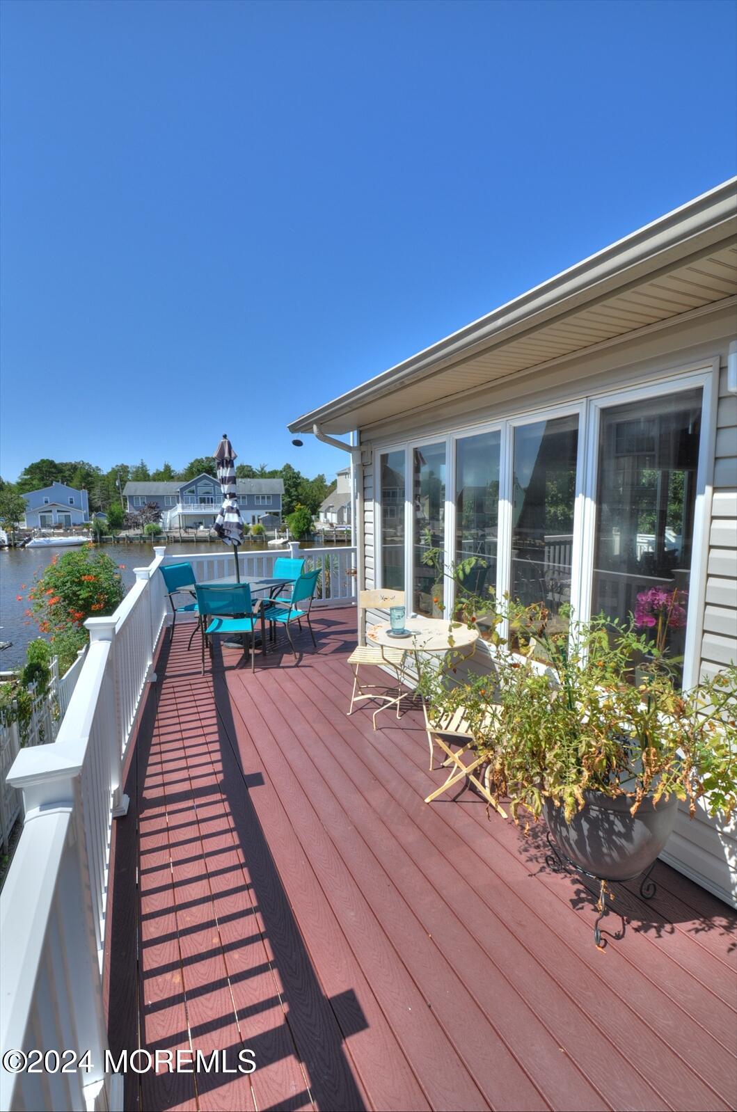 100 Cedar Run Road Bayville, NJ 08721 - Photo 8 of 39 a view of a house with a patio