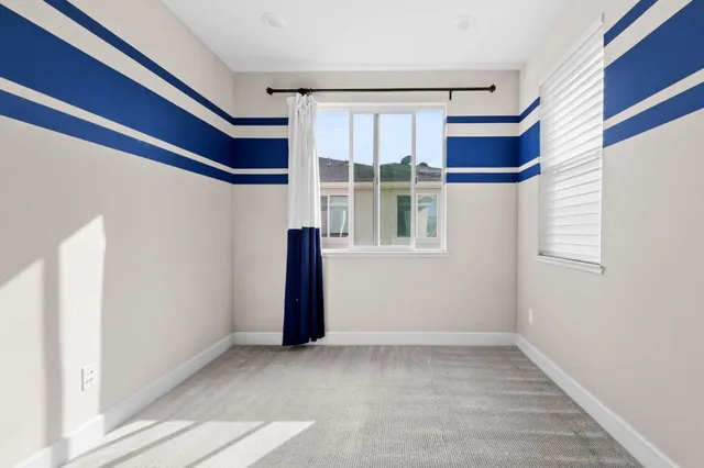 a view of a hallway with closet