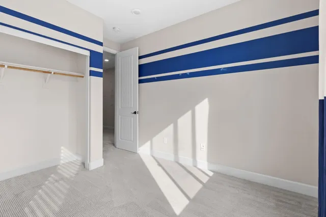 a view of a livingroom and a bathroom