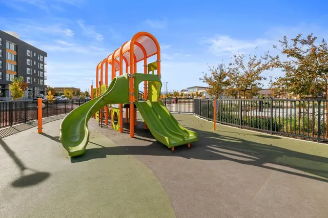 a view of a street with shops