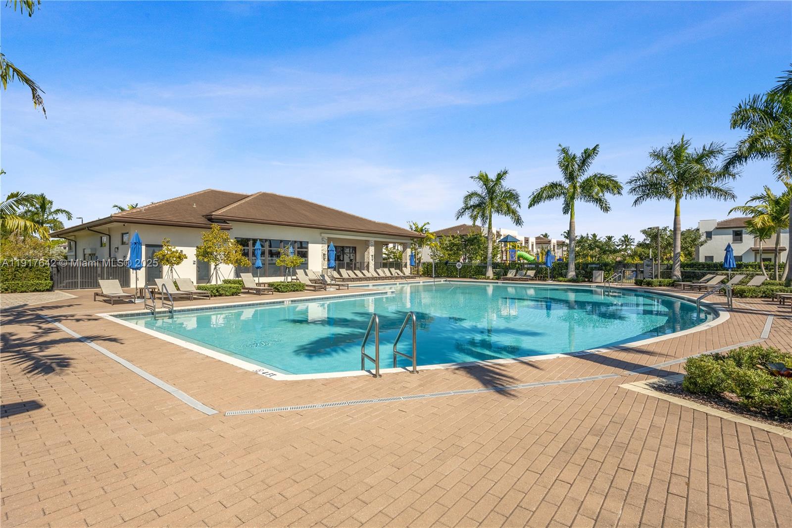 244 Northeast 210th Way, Unit 244 Miami, FL 33179 - Photo 25 of 32 a view of swimming pool and lake view