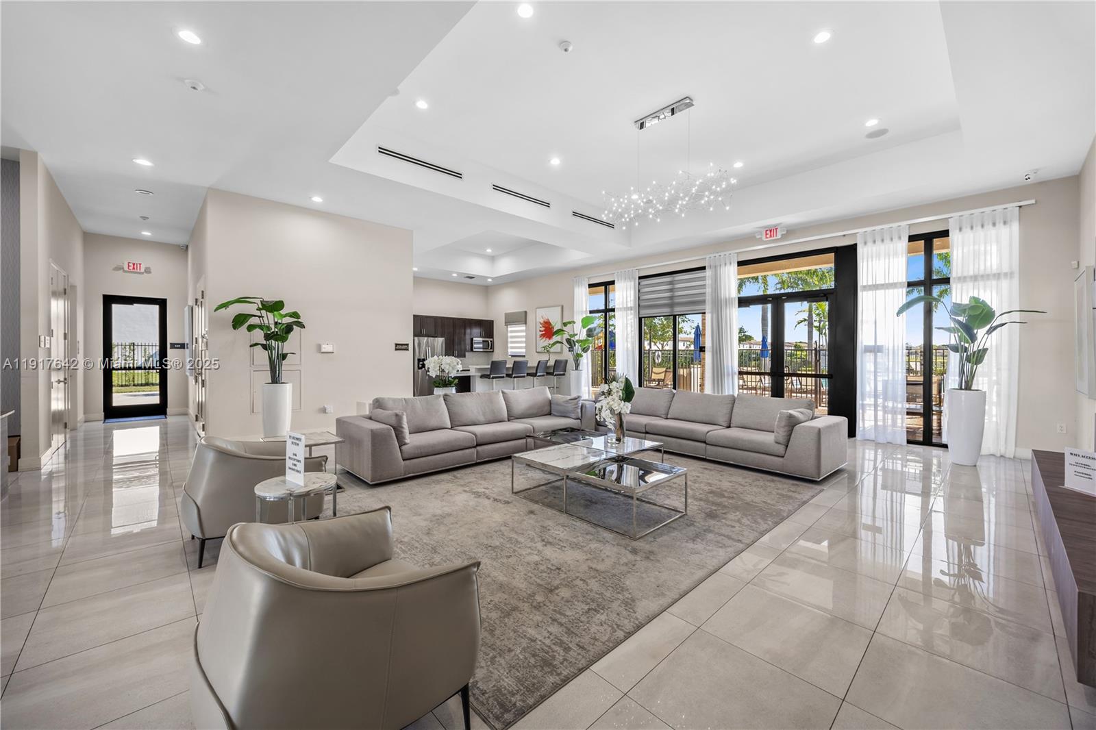 244 Northeast 210th Way, Unit 244 Miami, FL 33179 - Photo 30 of 32 a living room with furniture and a large window