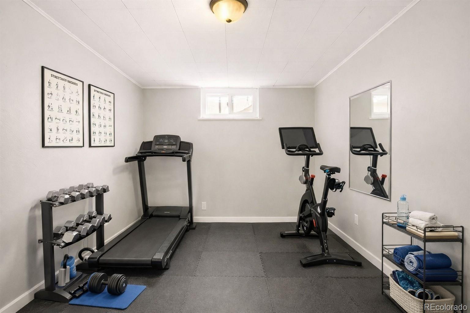 2438 South Perry Street Denver, CO 80219 - Photo 14 of 23 a view of a room with gym equipment