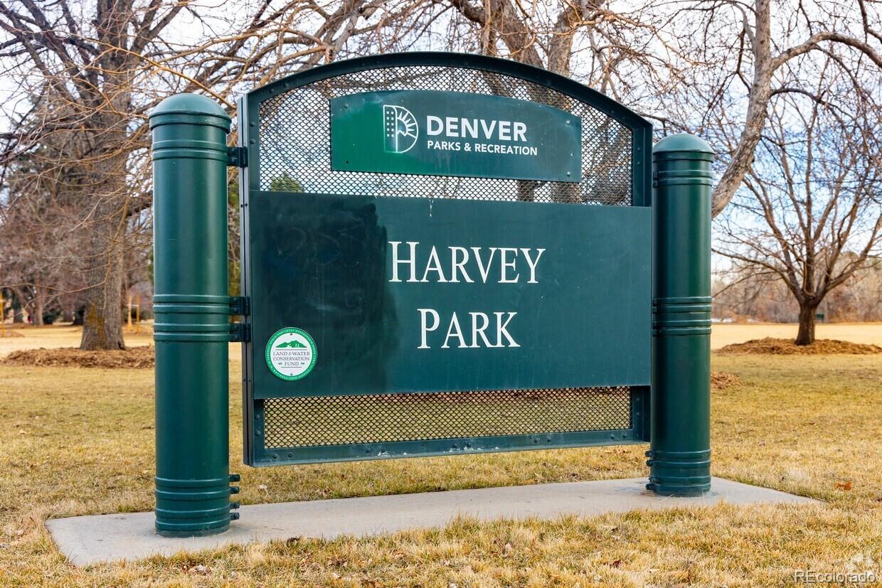 2438 South Perry Street Denver, CO 80219 - Photo 19 of 24 a sign on the side of a building