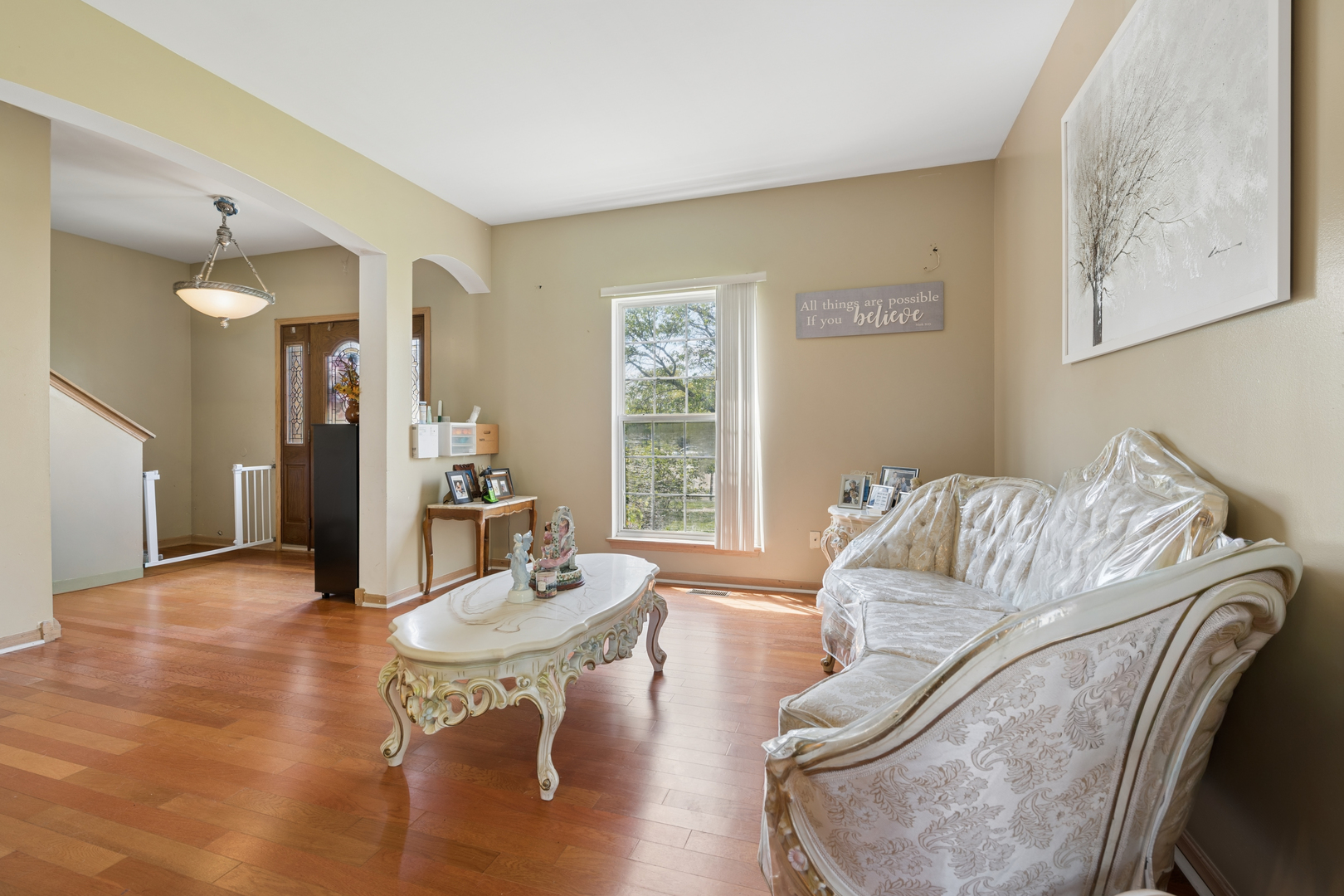 2014 Fieldstone Court Plainfield, IL 60586 - Photo 11 of 25 a living room with furniture and wooden floor
