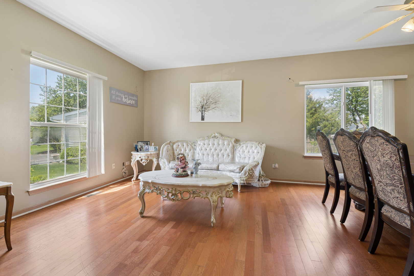 2014 Fieldstone Court Plainfield, IL 60586 - Photo 12 of 25 a living room with furniture and a large window