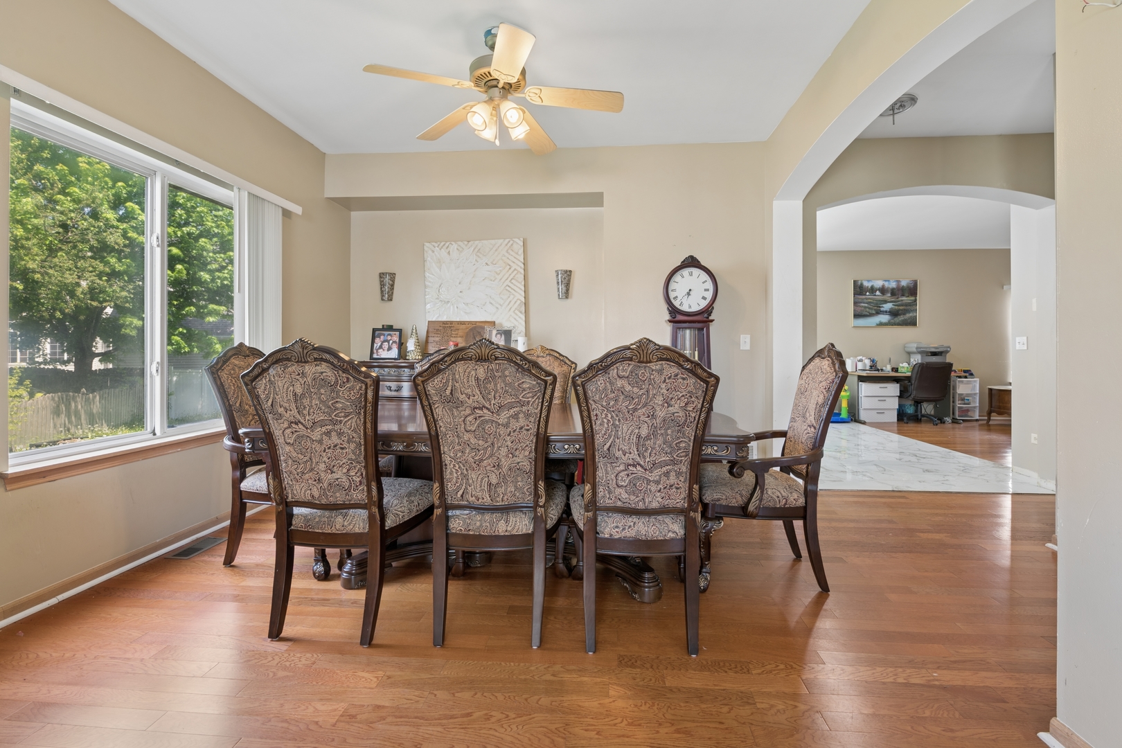 2014 Fieldstone Court Plainfield, IL 60586 - Photo 13 of 25 a view of a dining room with furniture window and wooden floor