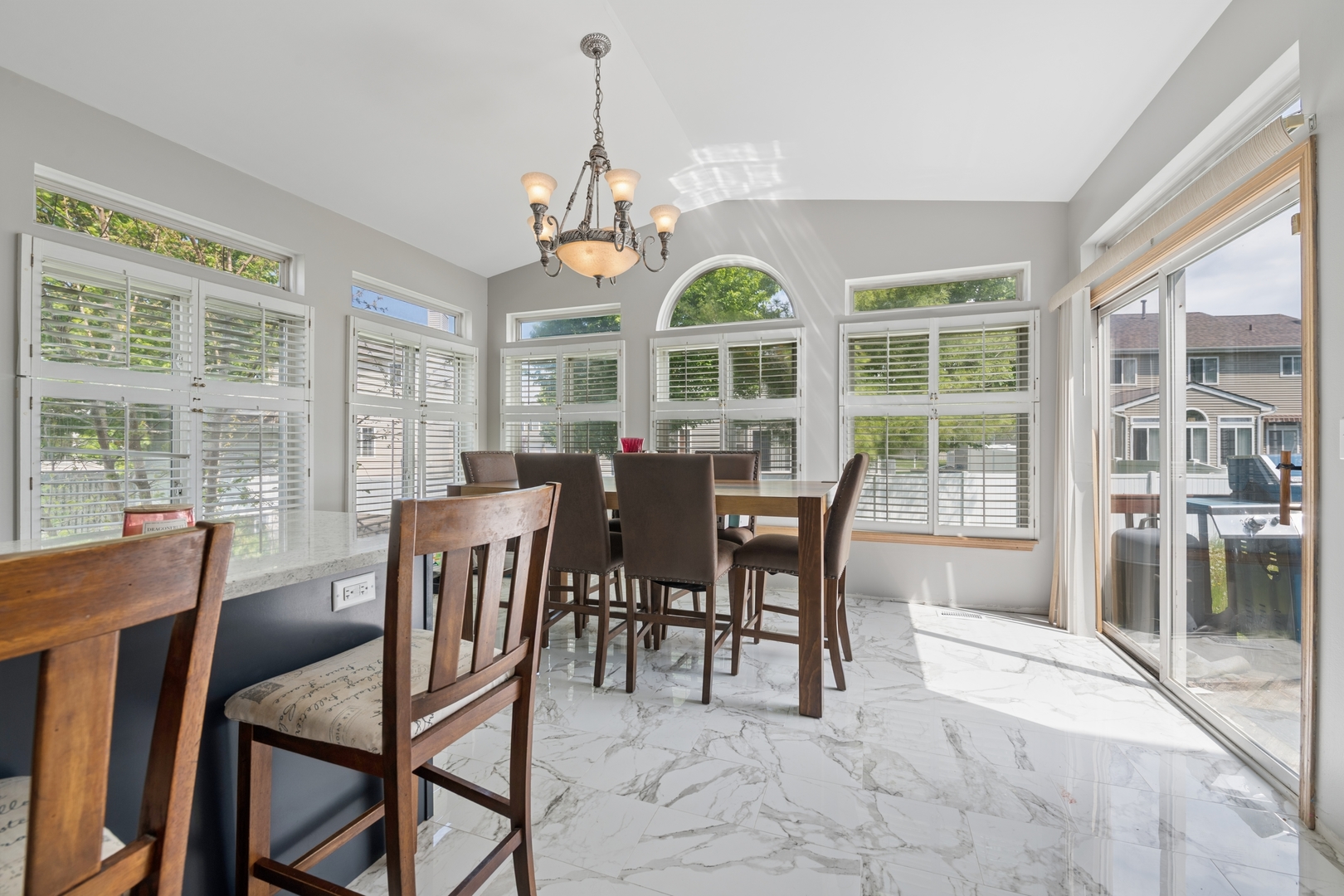 2014 Fieldstone Court Plainfield, IL 60586 - Photo 3 of 25 a view of a dining room with furniture window and outside view