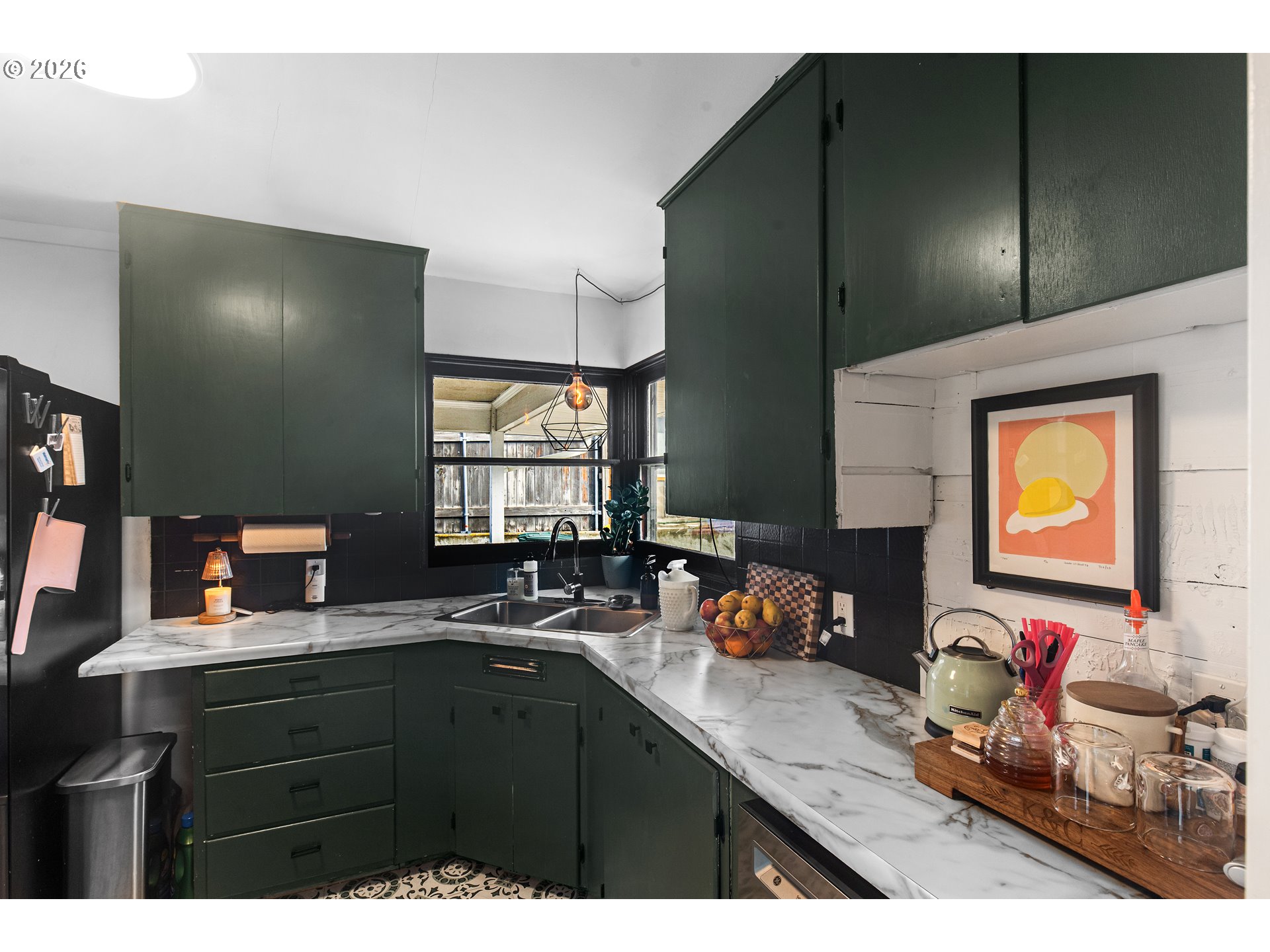 735 Northwest 10th Street Pendleton, OR 97801 - Photo 12 of 38 a kitchen with a sink stove and cabinets