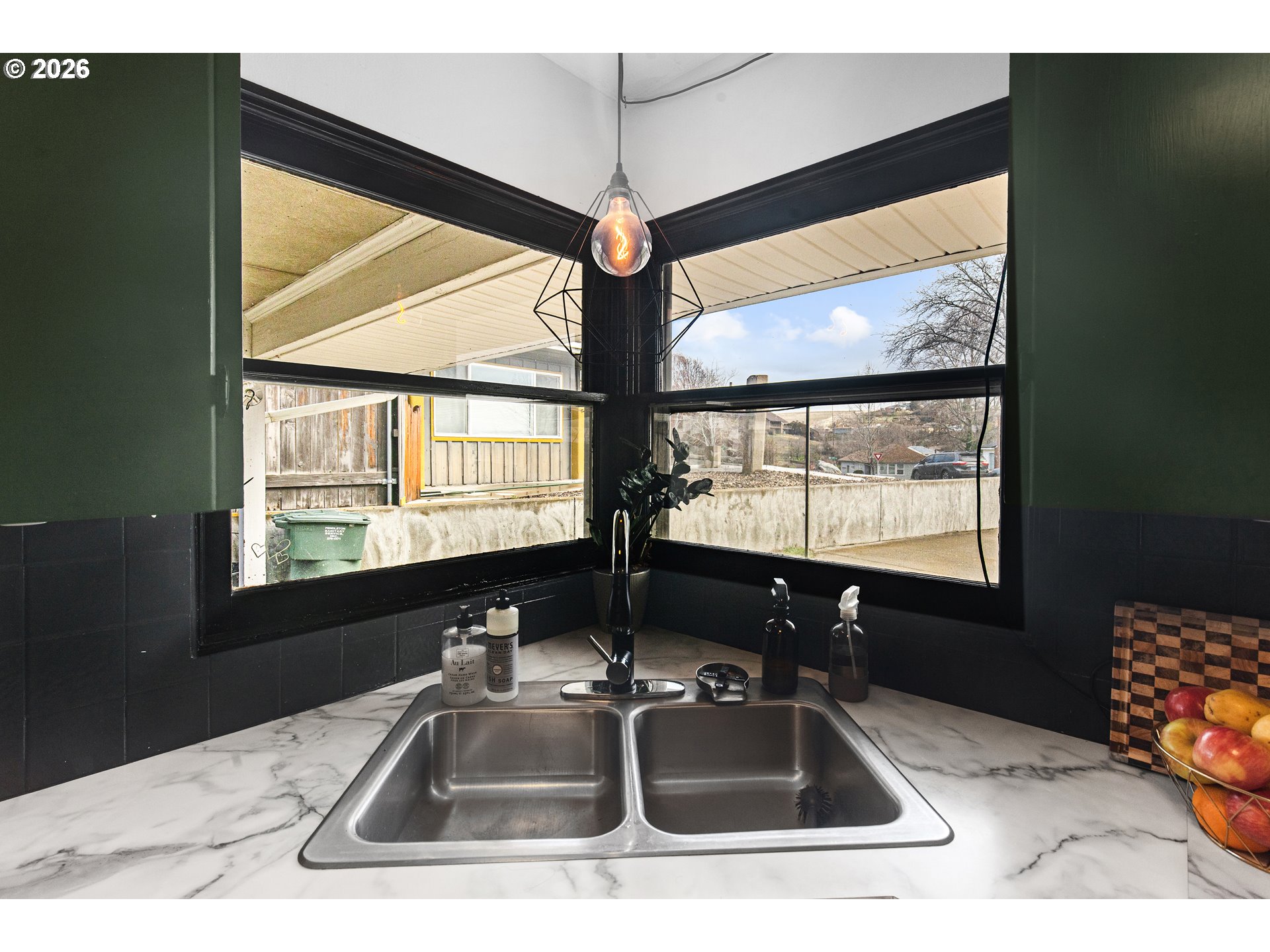 735 Northwest 10th Street Pendleton, OR 97801 - Photo 13 of 38 a kitchen with sink and large window