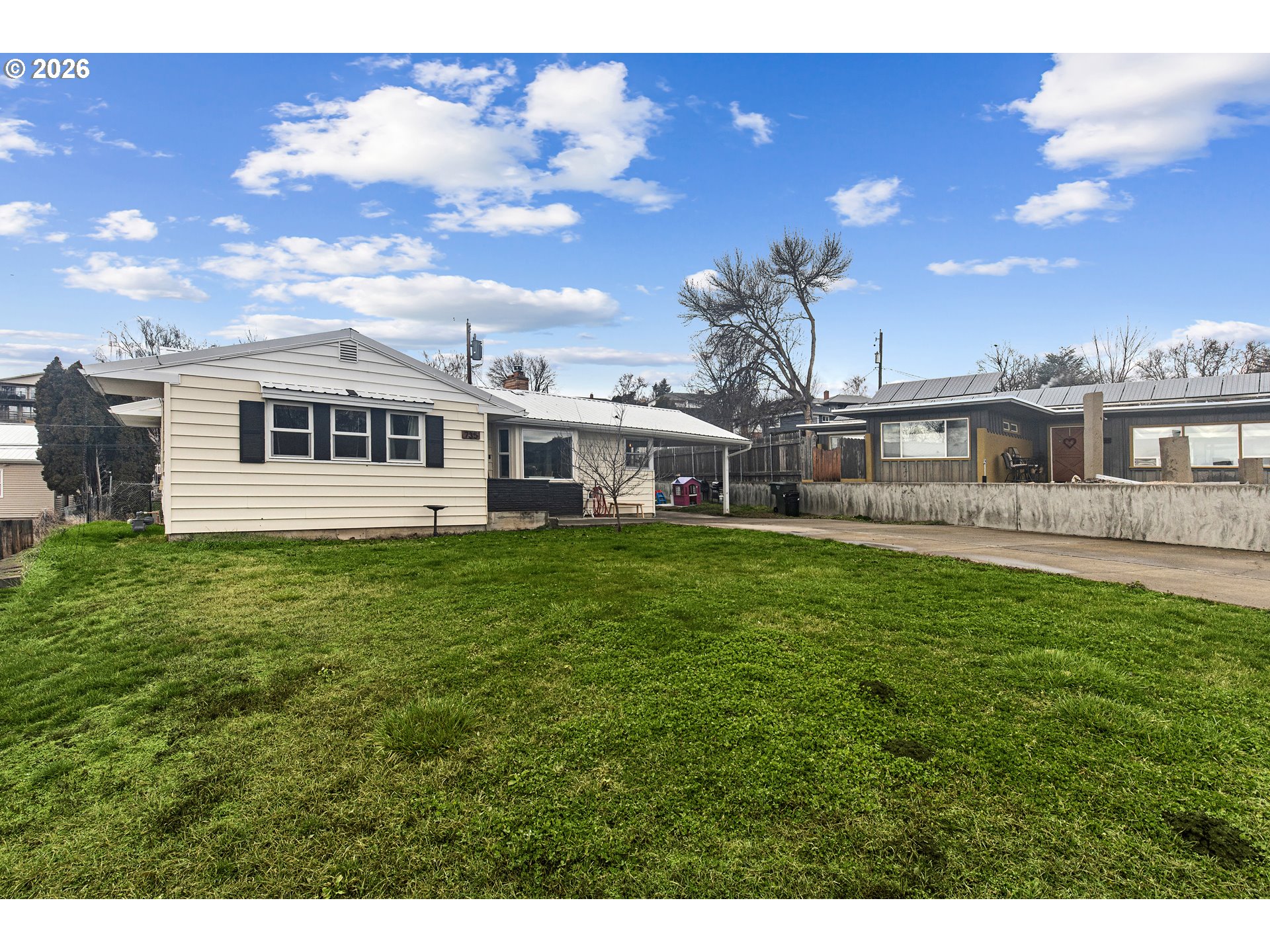 735 Northwest 10th Street Pendleton, OR 97801 - Photo 28 of 38 a view of a house with a backyard