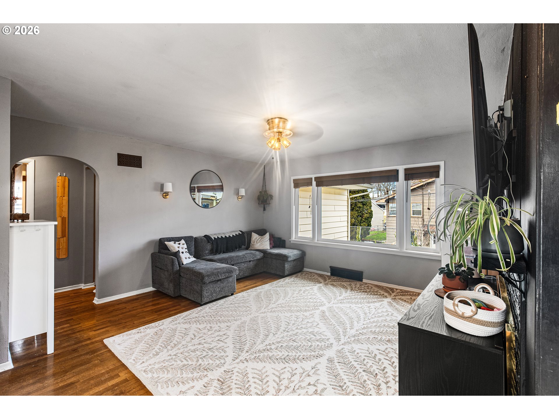 735 Northwest 10th Street Pendleton, OR 97801 - Photo 5 of 38 a bedroom with furniture and a window