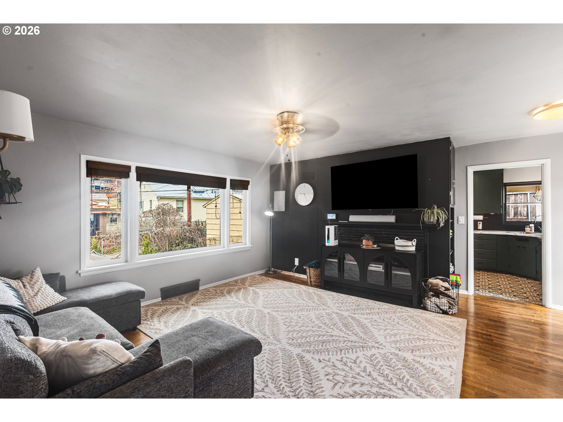 735 Northwest 10th Street Pendleton, OR 97801 - Photo 6 of 38 a bedroom with furniture and a flat screen tv