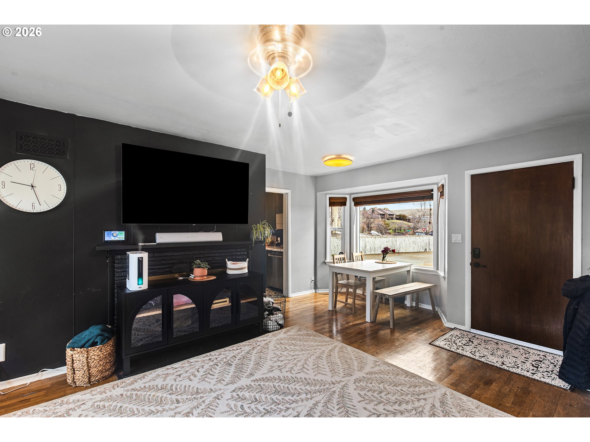 735 Northwest 10th Street Pendleton, OR 97801 - Photo 8 of 38 a living room with furniture and a flat screen tv