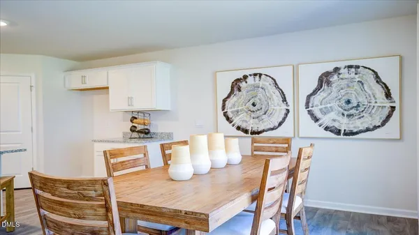 a view of a dining room with furniture