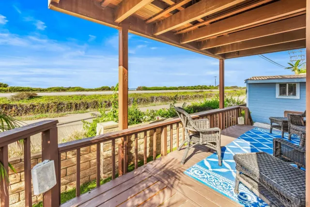 a view of a balcony with chairs