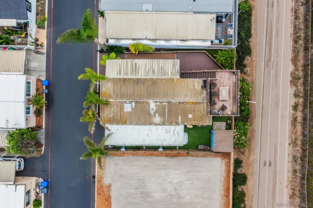 an aerial view of a house with a garden