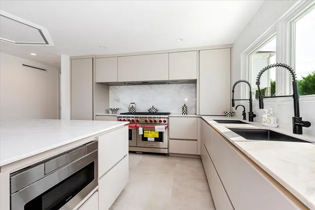 a dining room with furniture and entryway