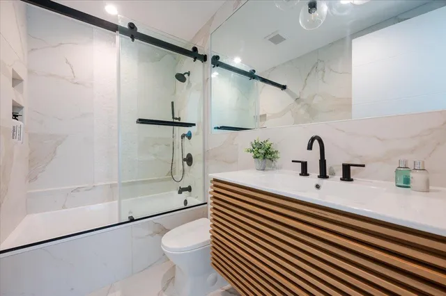 a bathroom with a sink and a shower