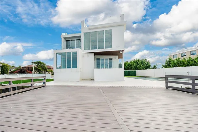 a view of a swimming pool with a patio
