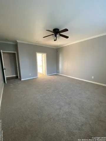 a bathroom with a double vanity sink mirror and bathtub