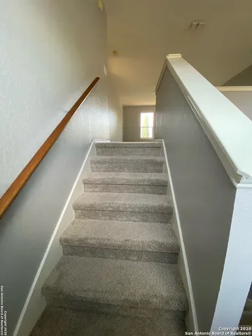 a bathroom with a toilet and a bathtub