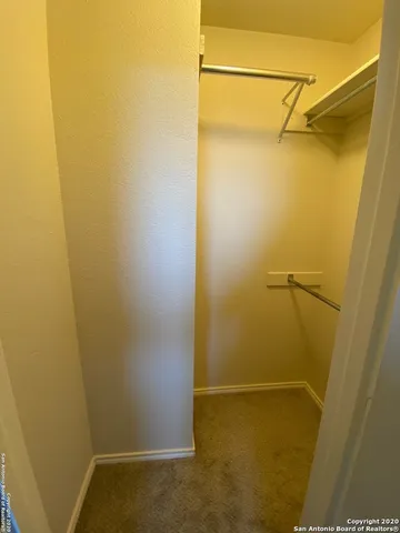 a bathroom with a shower and a toilet