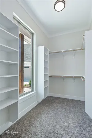 a view of room with walk in closet