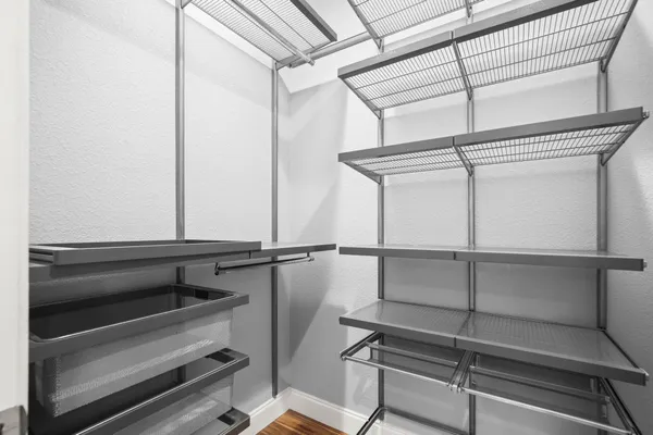 a view of room with racks on the wall