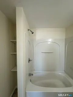 a bathroom with a bathtub