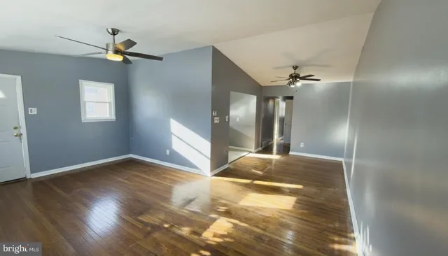 a view of hallway with windows