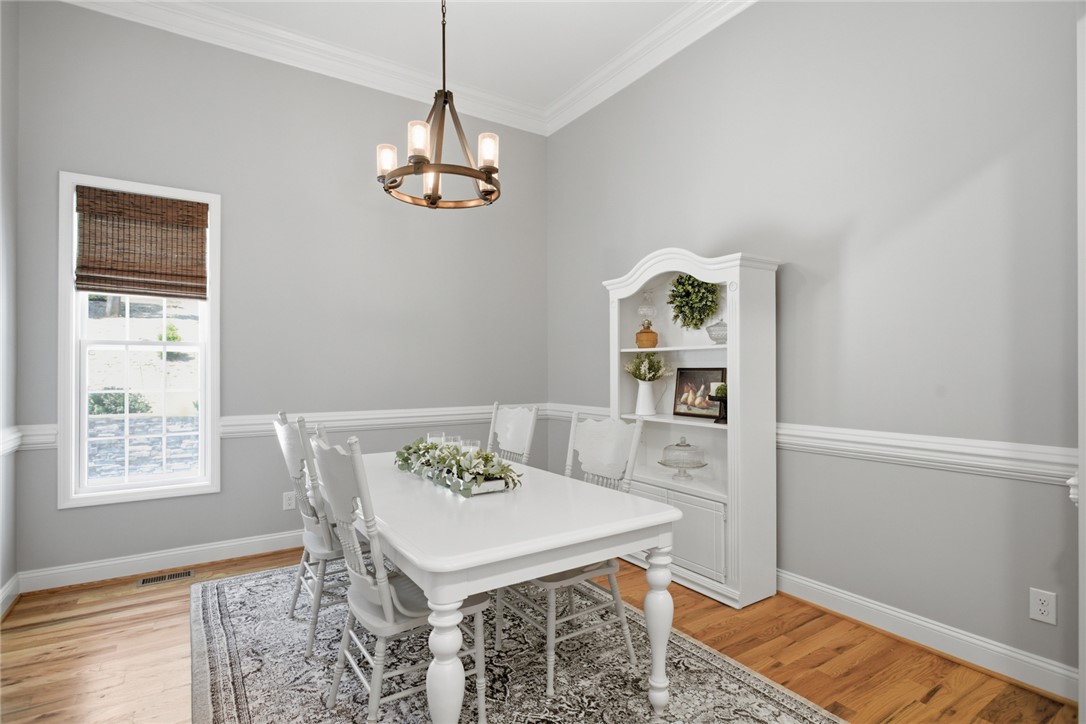 105 Winterbrook Circle Seneca, SC 29678 - Photo 17 of 48 This bright dining room features elegant crown molding, creating an inviting space.