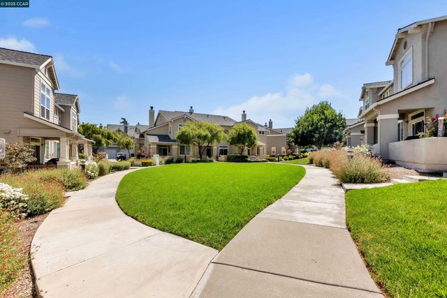 a view of a street with a building in the background