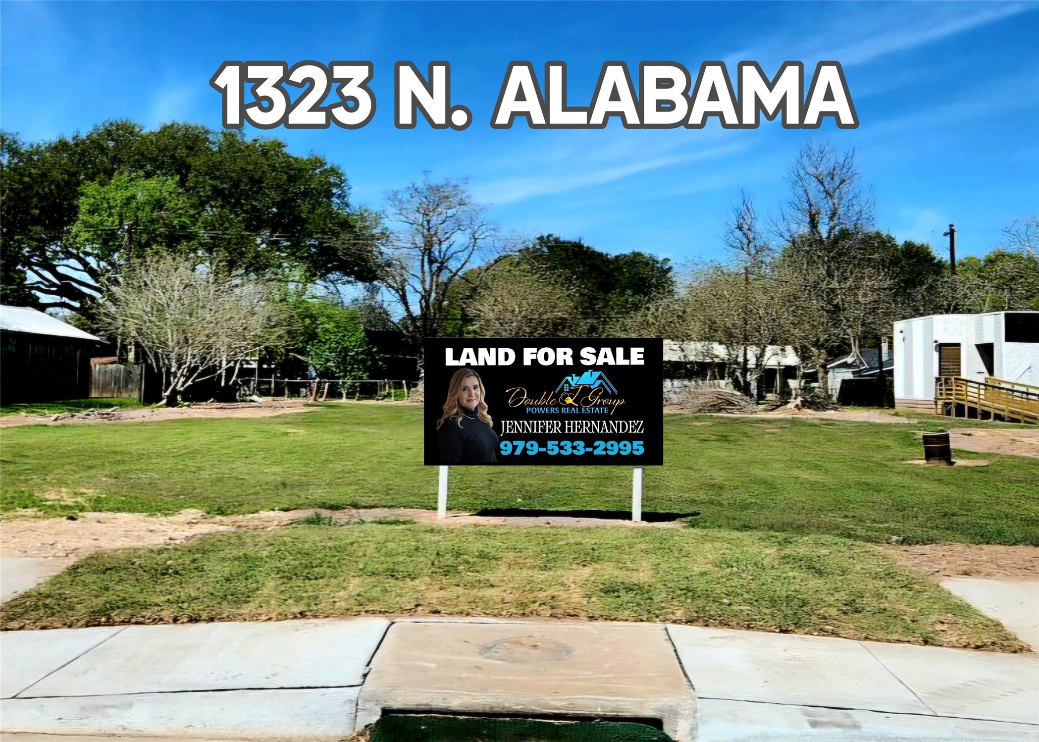 1323 North Alabama Road Wharton, TX 77488 - Photo 1 of 3 a sign that is sitting on the side of a road
