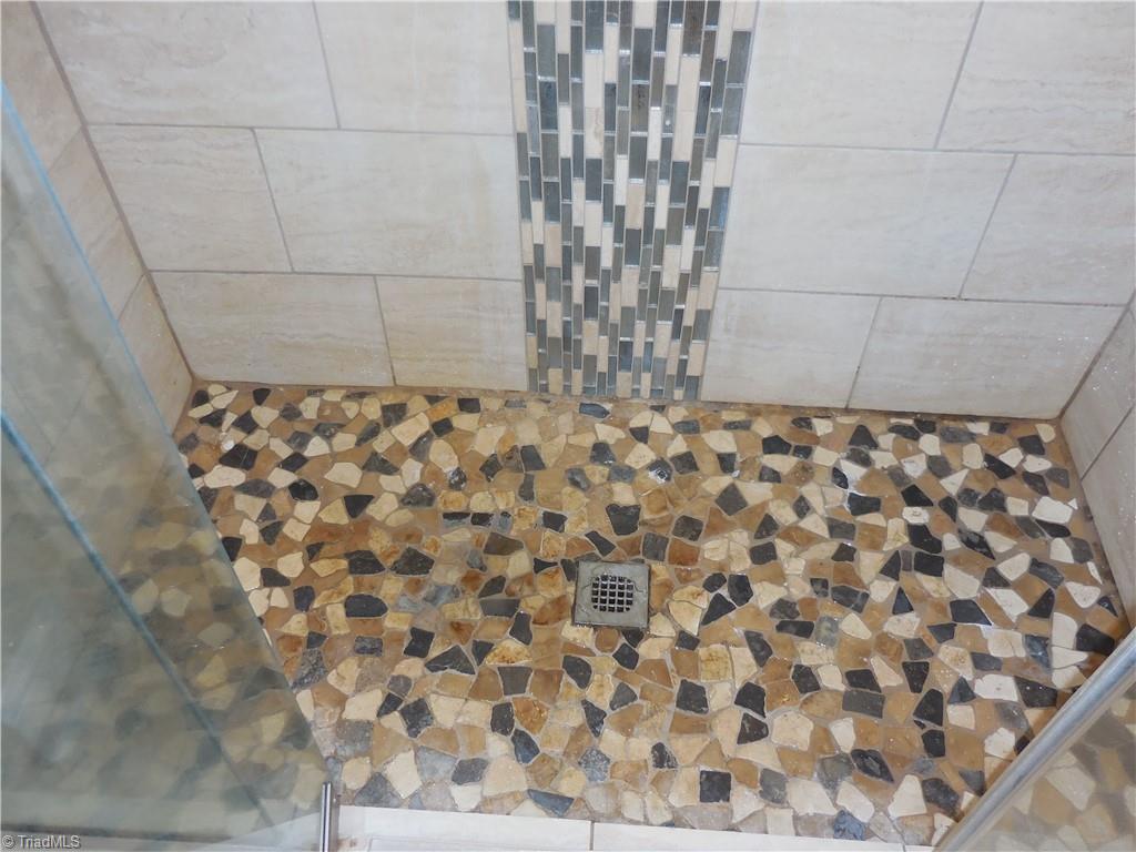 1719 Neelley Road Pleasant Garden, NC 27313 - Photo 11 of 35 Owners Suite Shower Floor