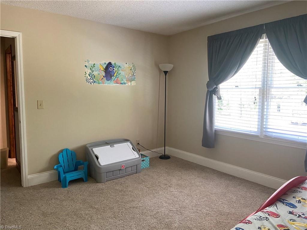 1719 Neelley Road Pleasant Garden, NC 27313 - Photo 25 of 35 Upstairs Bedroom 3. 13'x11'4"