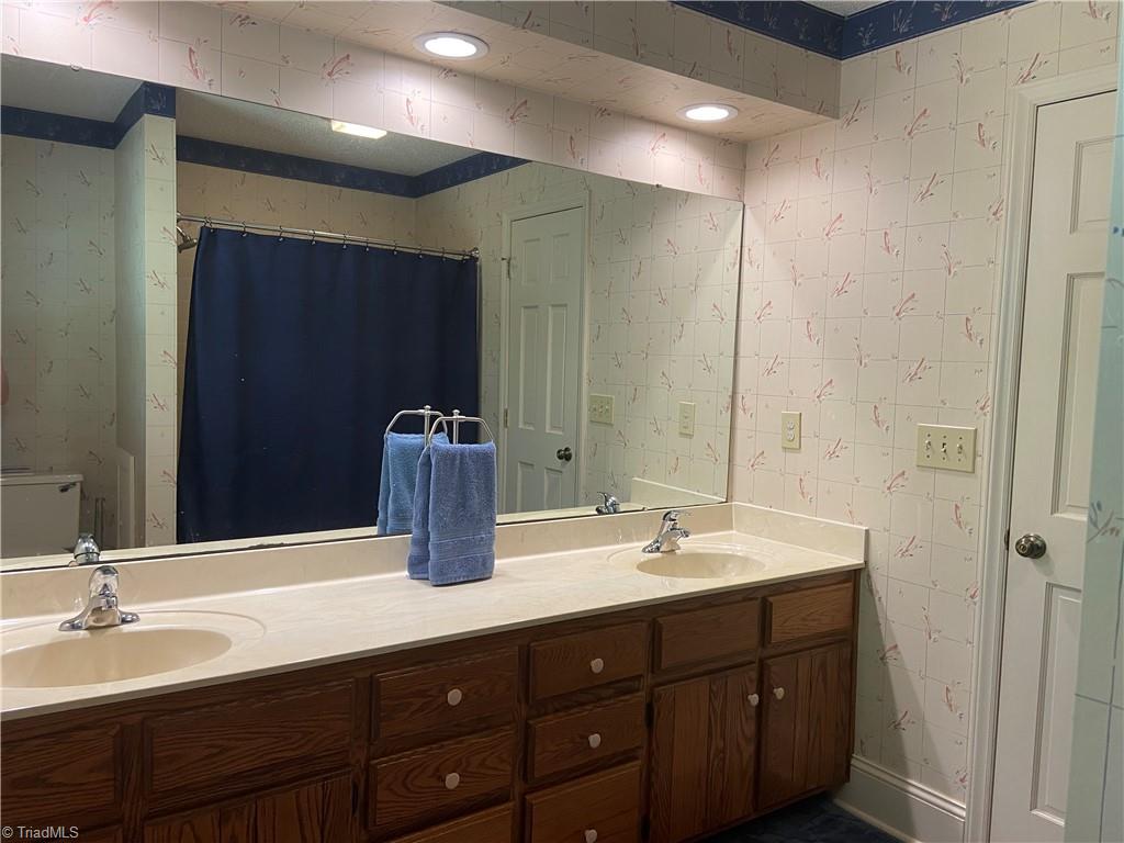1719 Neelley Road Pleasant Garden, NC 27313 - Photo 29 of 35 Upstairs Bath
