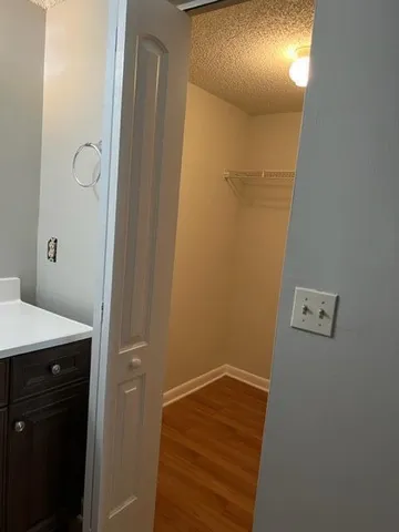 a bathroom with a sink and mirror