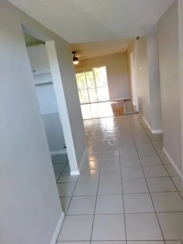 a view of entryway with stairs and a window