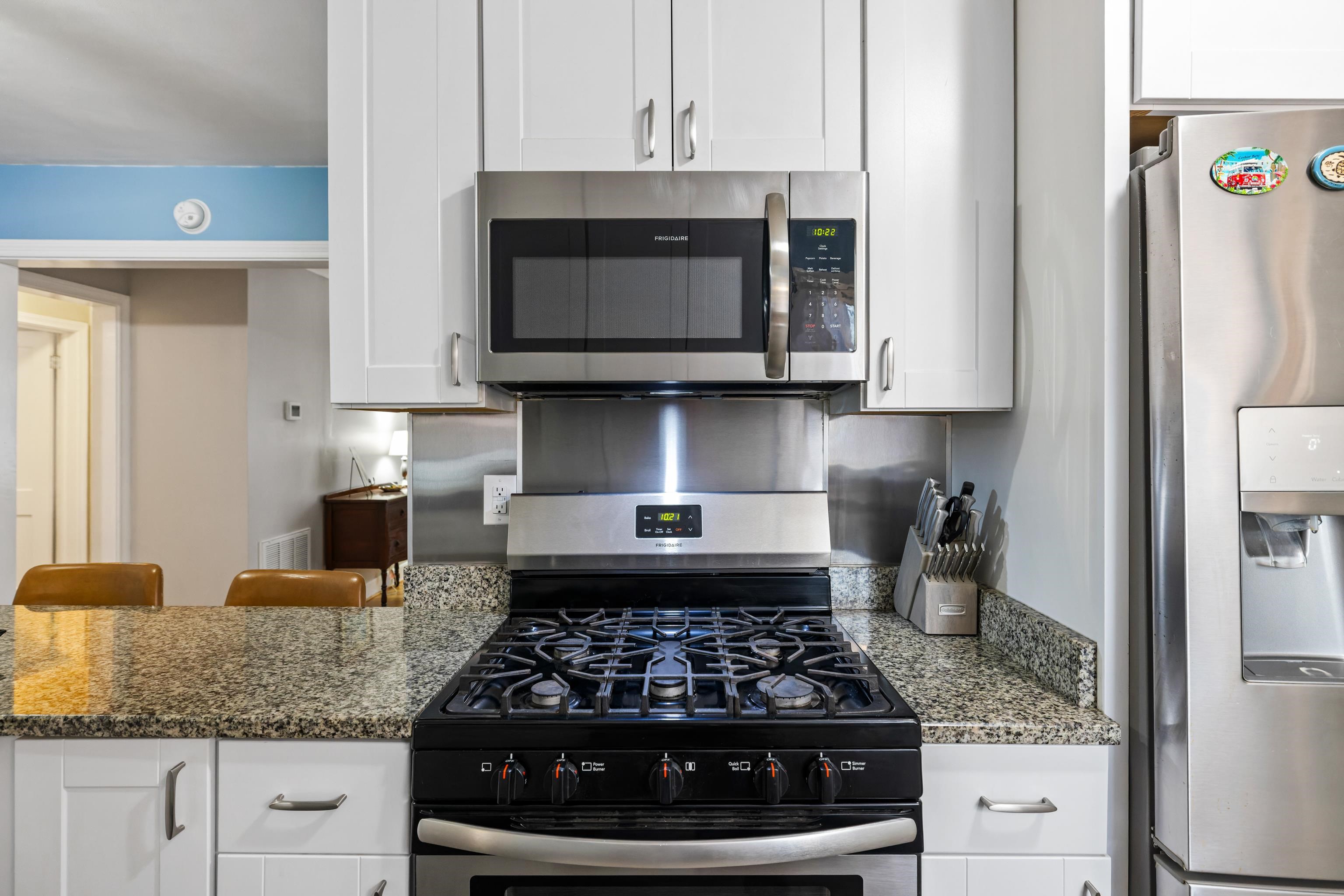 212 Alphin Avenue Waynesboro, VA 22980 - Photo 19 of 63 a kitchen with stainless steel appliances granite countertop a stove and a microwave