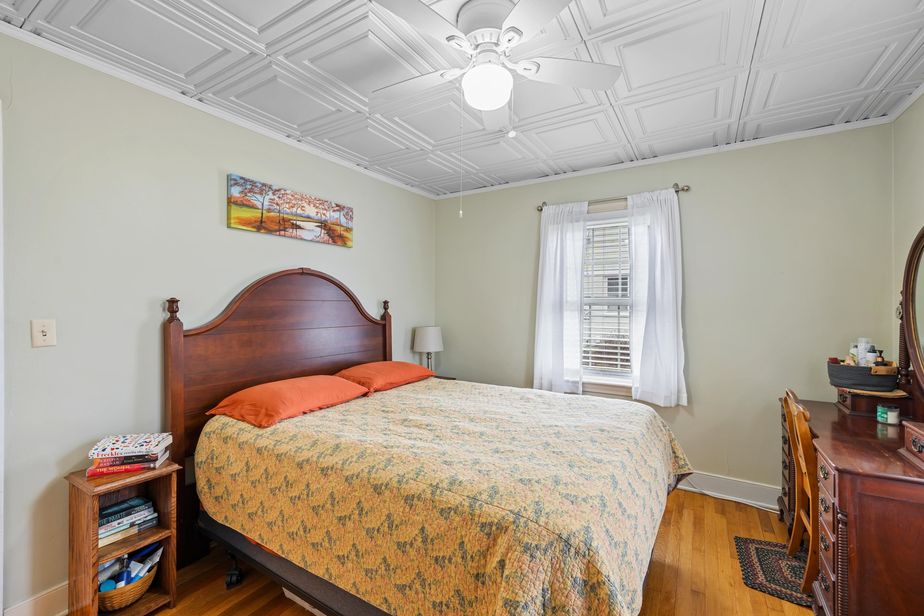 212 Alphin Avenue Waynesboro, VA 22980 - Photo 35 of 63 a bed sitting in a bedroom next to a window