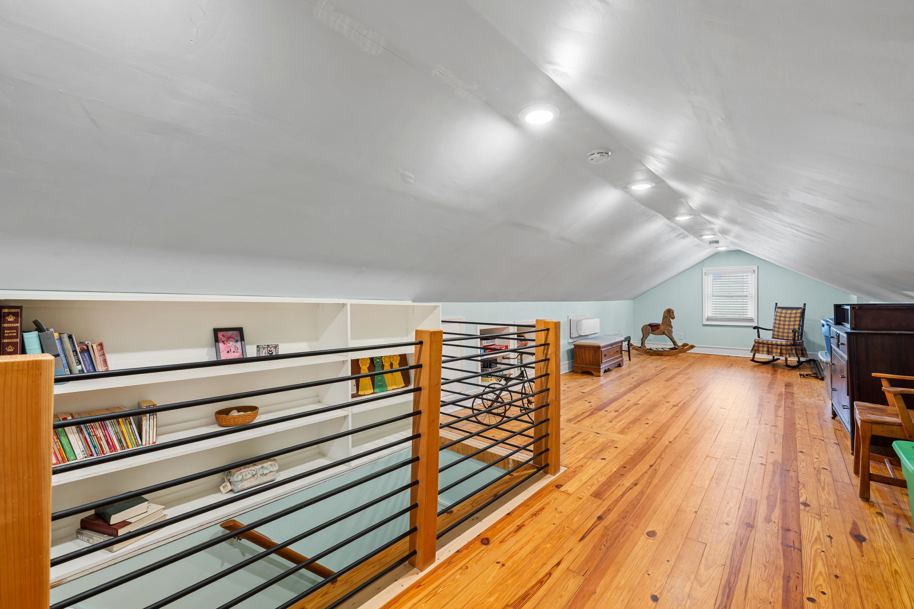 212 Alphin Avenue Waynesboro, VA 22980 - Photo 36 of 63 a living room with furniture and a wooden floor