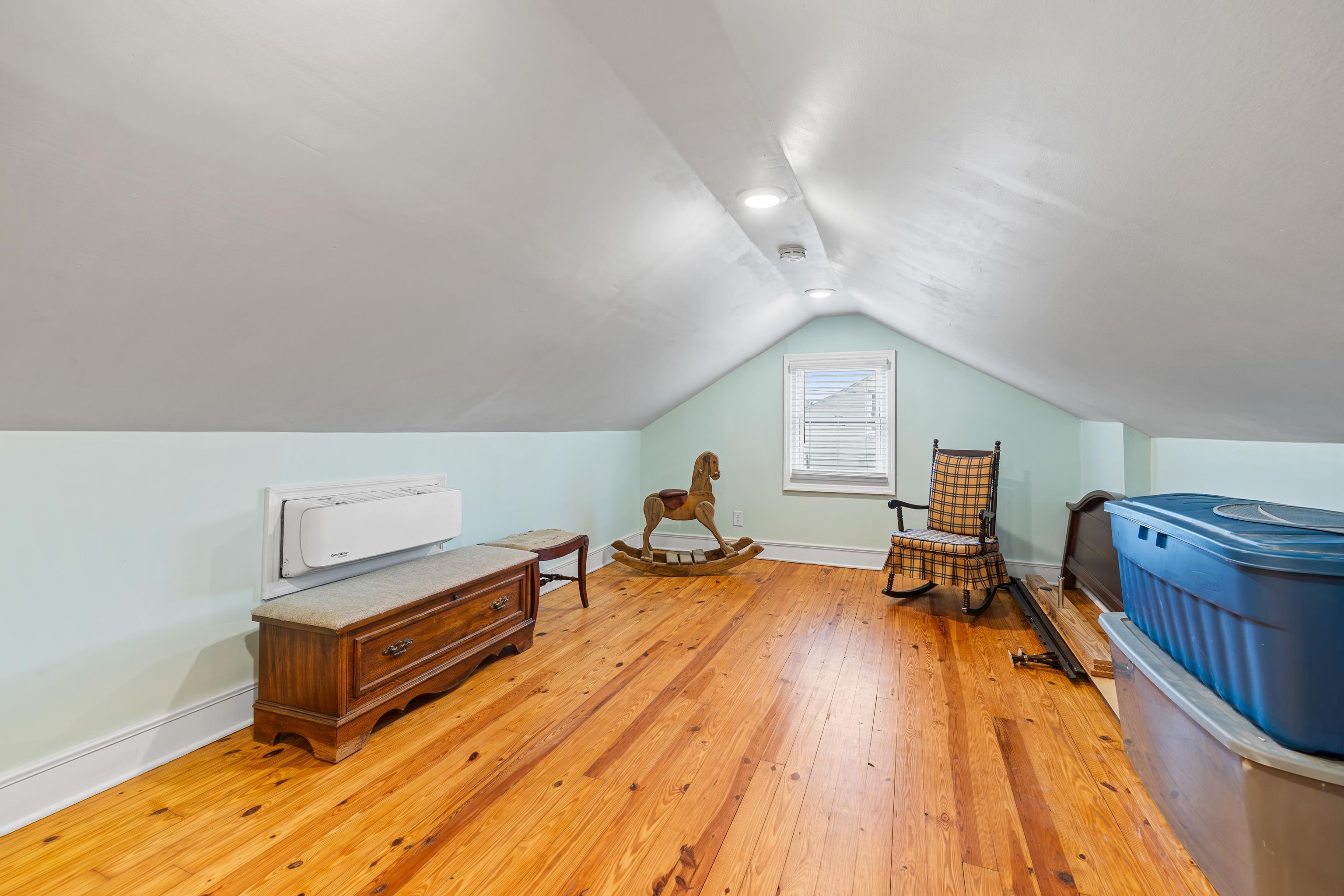 212 Alphin Avenue Waynesboro, VA 22980 - Photo 37 of 63 a bedroom with furniture and a wooden floor