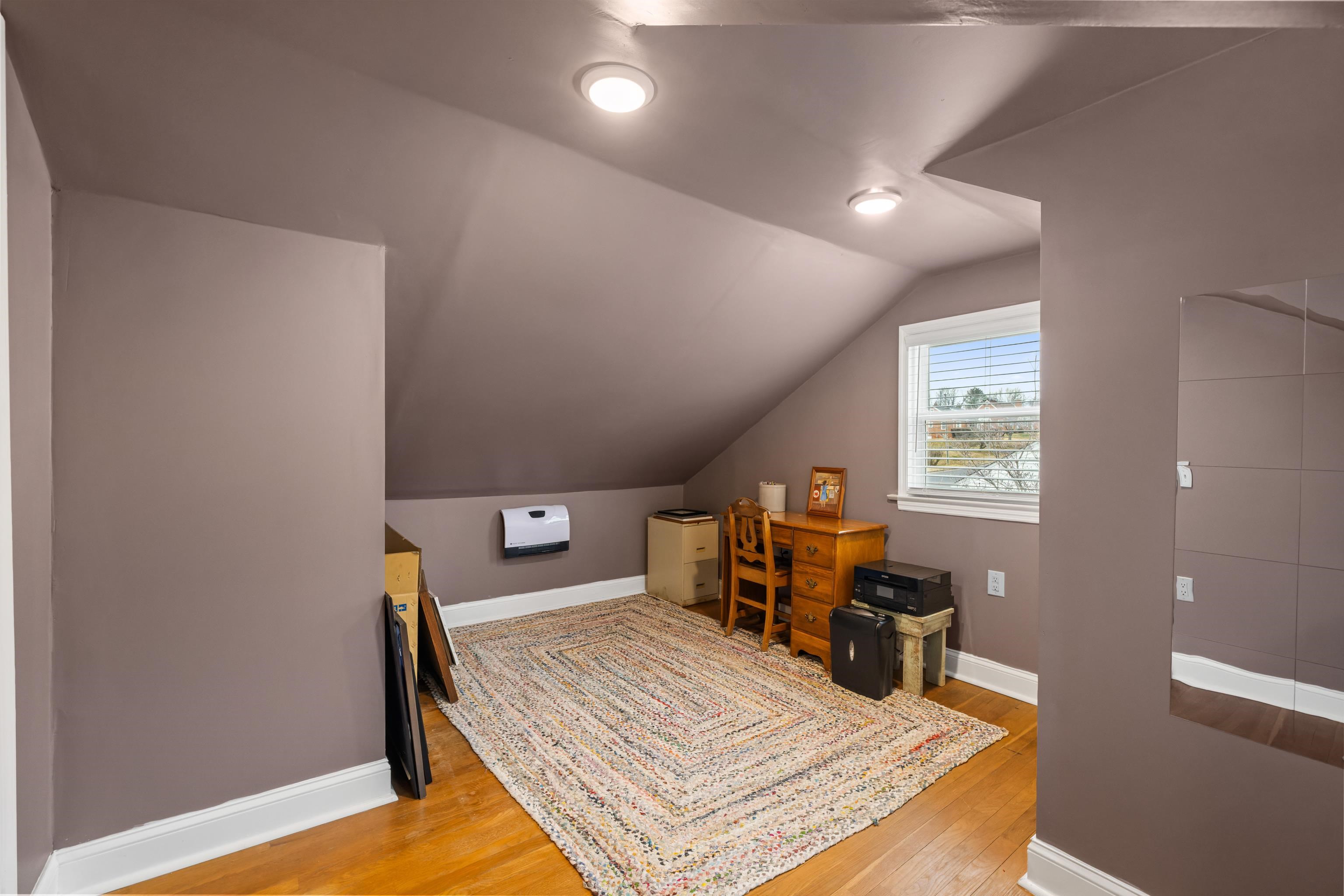 212 Alphin Avenue Waynesboro, VA 22980 - Photo 39 of 63 a living room with furniture and a wooden floor