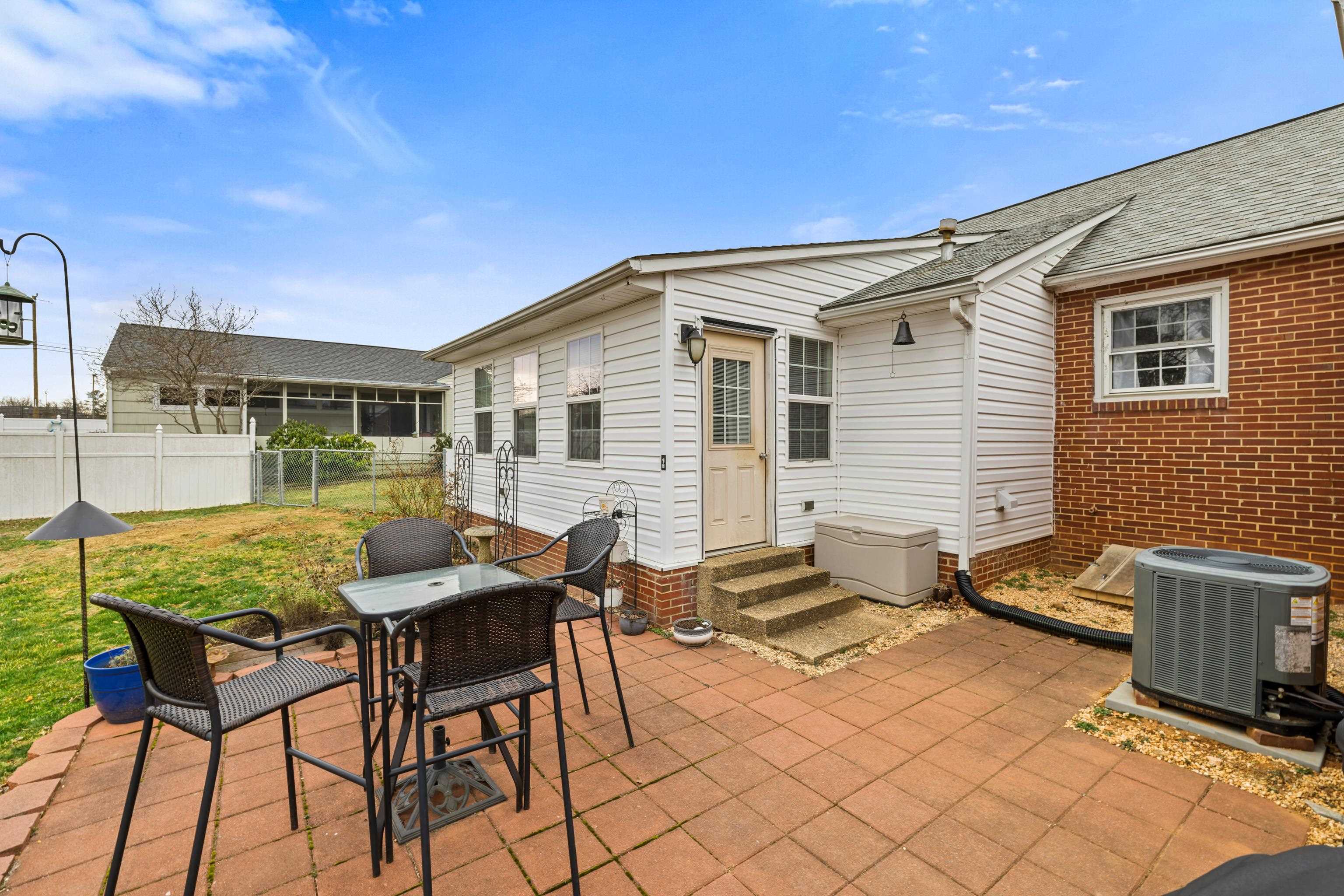 212 Alphin Avenue Waynesboro, VA 22980 - Photo 49 of 63 a view of a backyard with furniture and a backyard