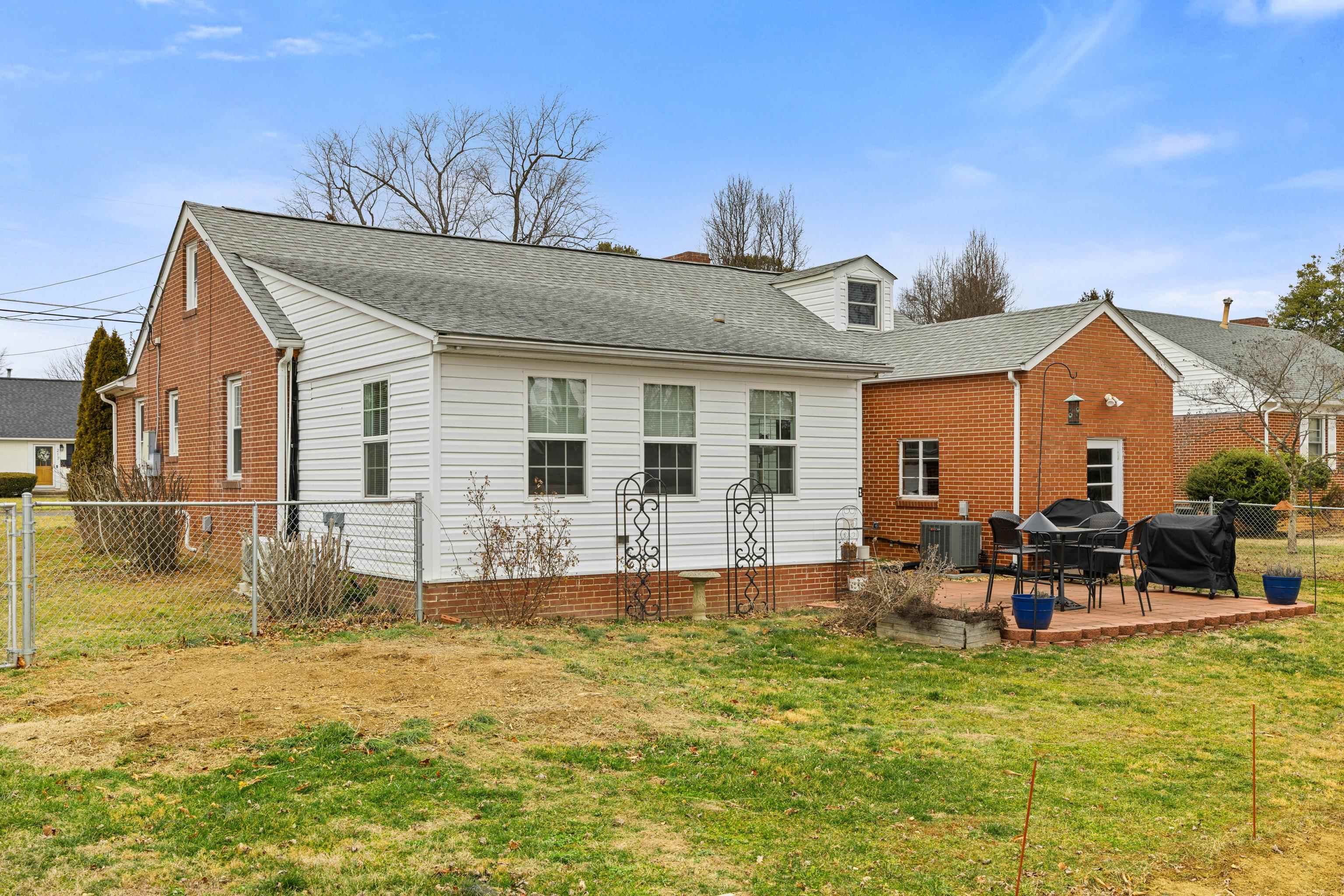 212 Alphin Avenue Waynesboro, VA 22980 - Photo 53 of 63 a view of a house with backyard and sitting area
